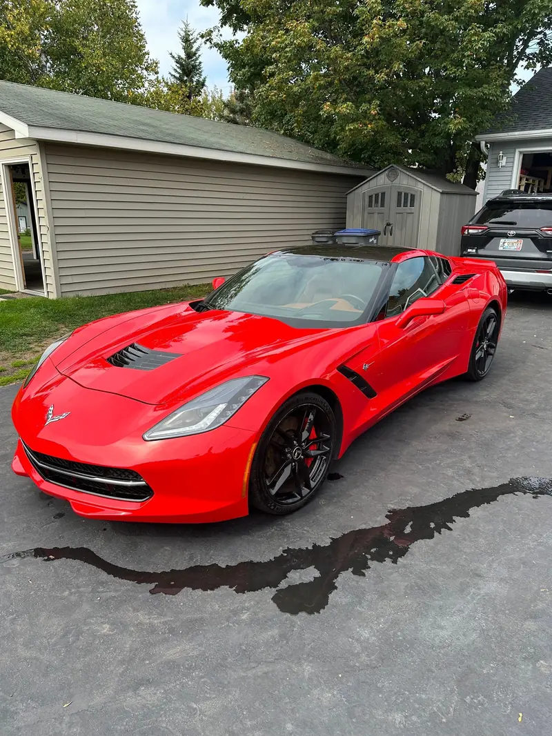 A red Corvette after an exterior detail
